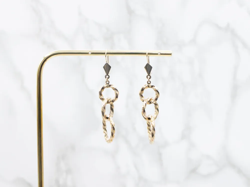 Twisting Graduating Gouden Ring Drop Earrings