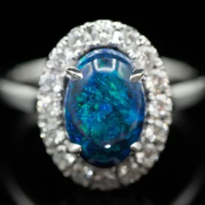 18K Wit Gold Black Opal Oval and Diamond Halo Ring