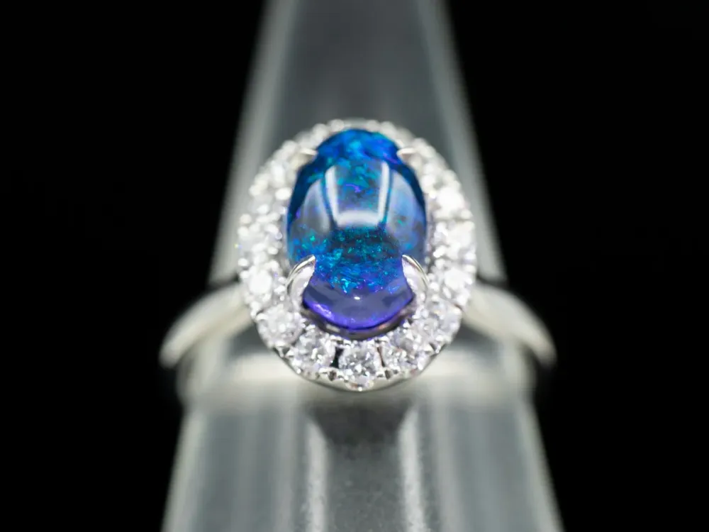 18K Wit Gold Black Opal Oval and Diamond Halo Ring