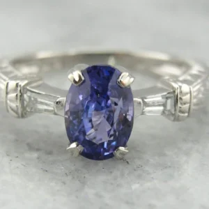 Contemporary Sapphire and Tapered Baguette Diamond Engagement Ring Platinum