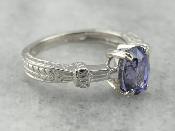 Contemporary Sapphire and Tapered Baguette Diamond Engagement Ring Platinum