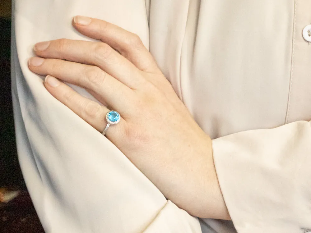 Modern White Gold Blue Topaz and Diamond Halo Ring
