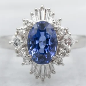 Platinum Oval Cut Sapphire Engagement Ring Round and Baguette Cut Diamond Halo