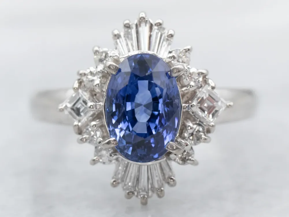 Platinum Oval Cut Sapphire Engagement Ring Round and Baguette Cut Diamond Halo