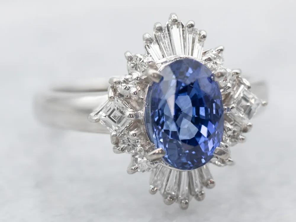 Platinum Oval Cut Sapphire Engagement Ring Round and Baguette Cut Diamond Halo