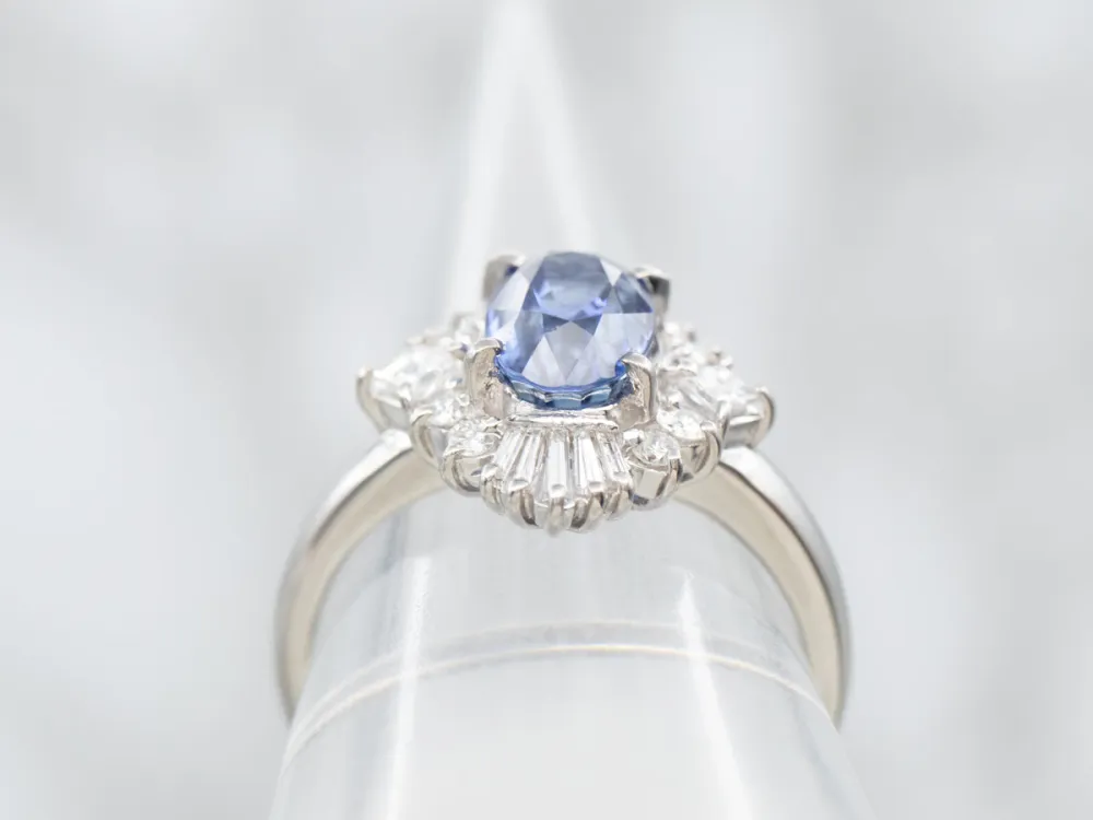 Platinum Oval Cut Sapphire Engagement Ring Round and Baguette Cut Diamond Halo
