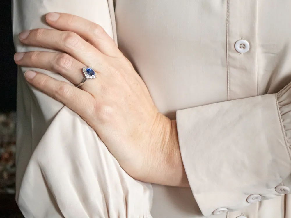 Platinum Oval Cut Sapphire Engagement Ring Round and Baguette Cut Diamond Halo