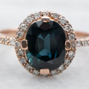 Rose Gold Sapphire and Diamond Halo Ring
