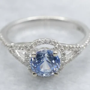 Strak Bi-Color Sapphire and Diamond Halo Engagement Ring