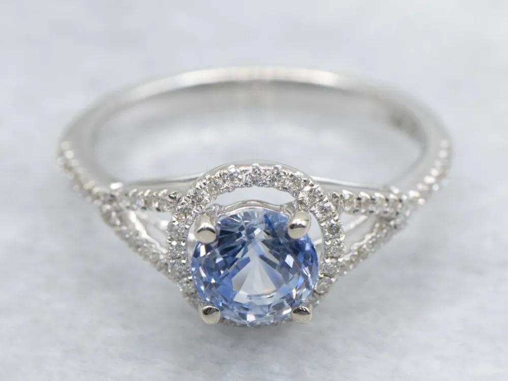 Strak Bi-Color Sapphire and Diamond Halo Engagement Ring