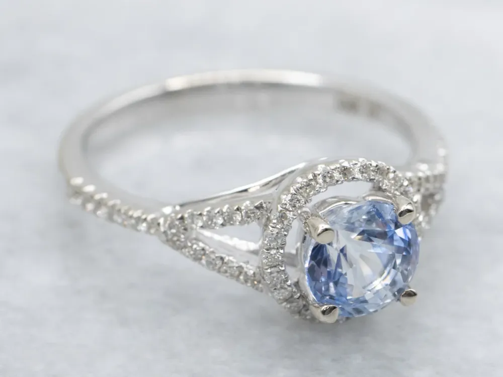Strak Bi-Color Sapphire and Diamond Halo Engagement Ring