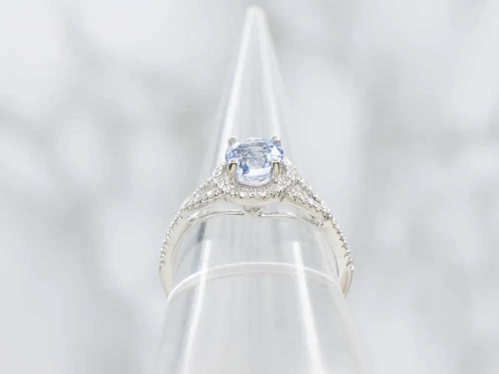 Strak Bi-Color Sapphire and Diamond Halo Engagement Ring