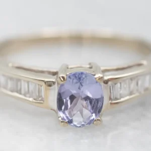 Striking White Gouden Tanzanite Ring Diamond Accents