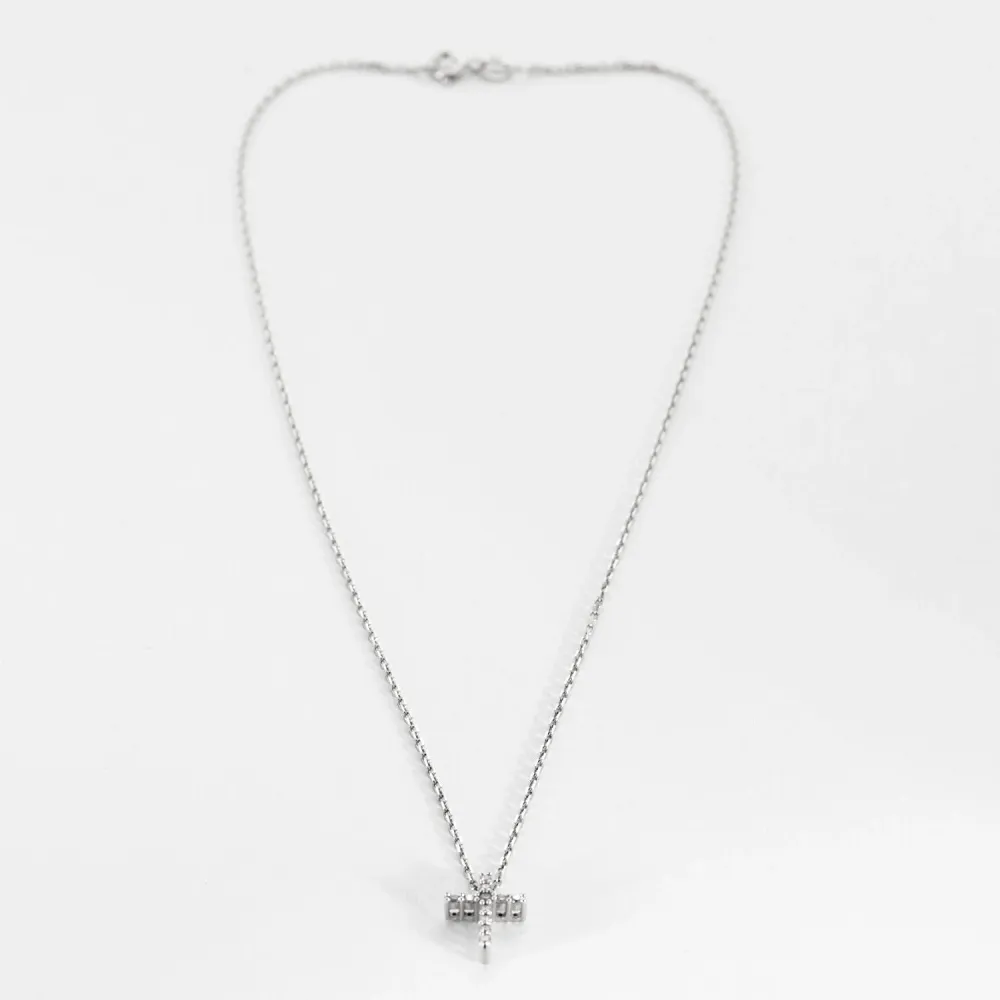 White gold and diamond cross pendant and chain