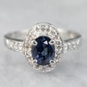 White Gold Sapphire and Diamond Actueel Halo Engagement Ring