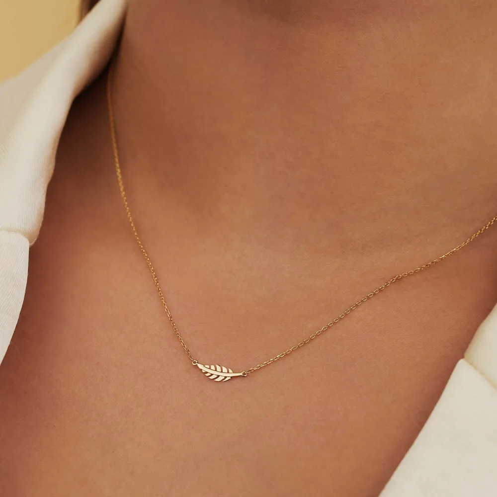 Monceau Giselle 14 karaat gouden ketting met veertje