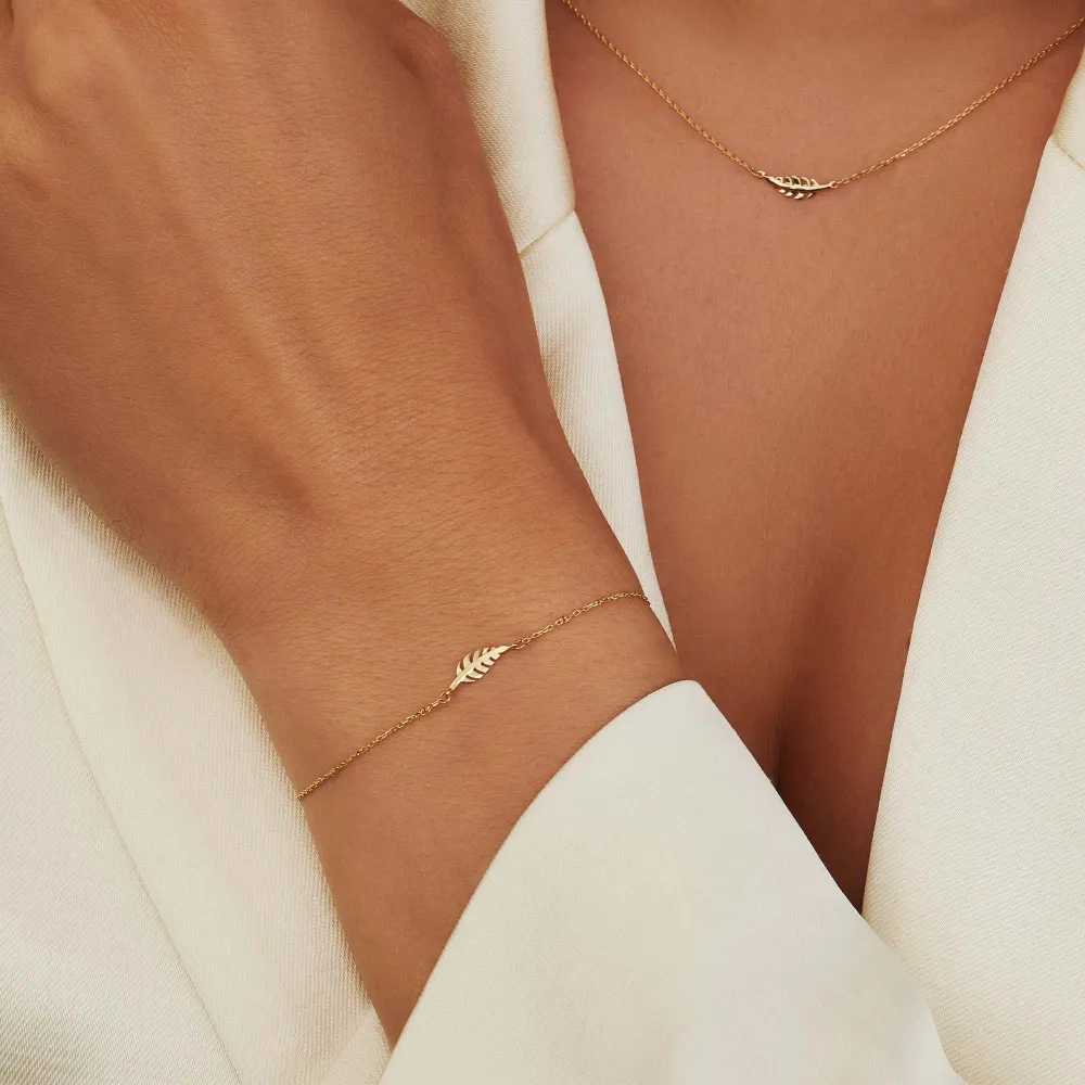 Monceau Giselle 14 karaat gouden ketting met veertje