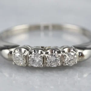 Four Diamond Ivoor Gold Band Ring